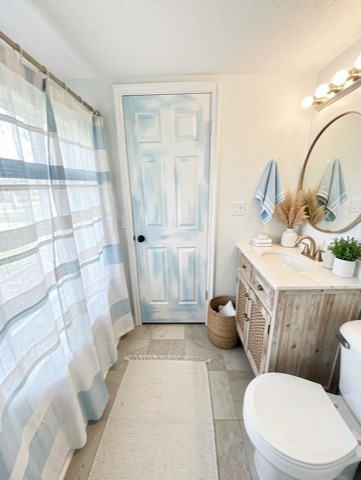Bathroom (round mirror) — Coastal